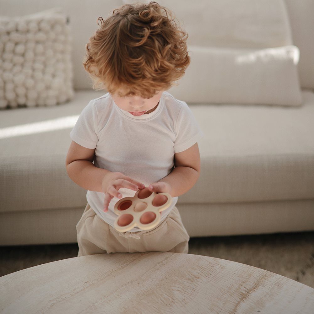 Mushie Flower Press Toy - Shifting Sand