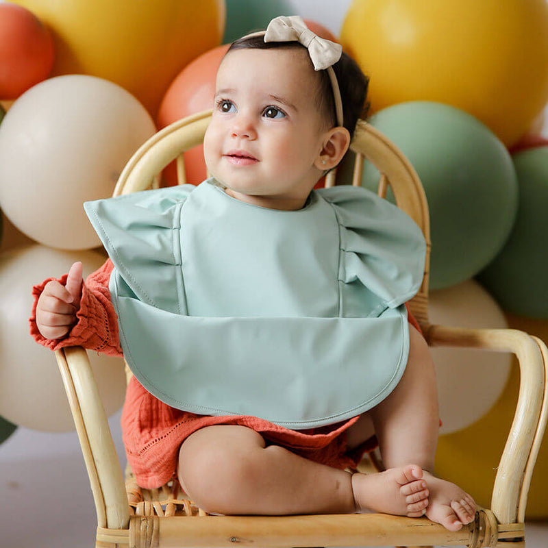 Waterproof snuggle bib in sage frill